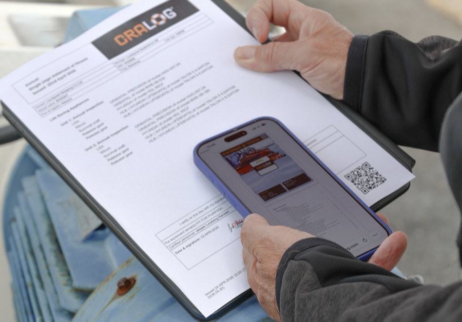 A printed CRALOG Statement of Fitness with a scan-to-view QR code, beside the digital Statement of Fitness on a phone